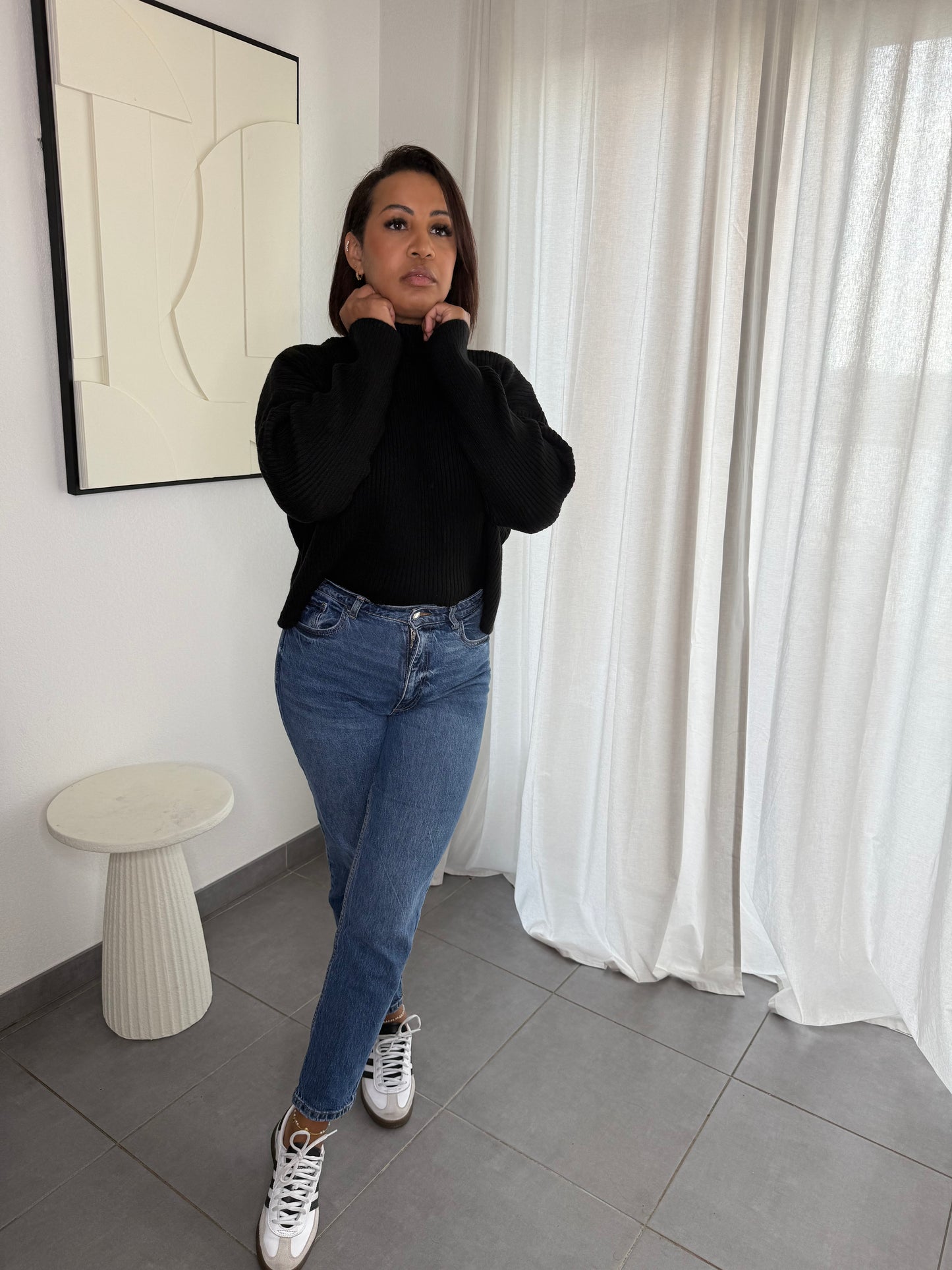 Pull noir col montant